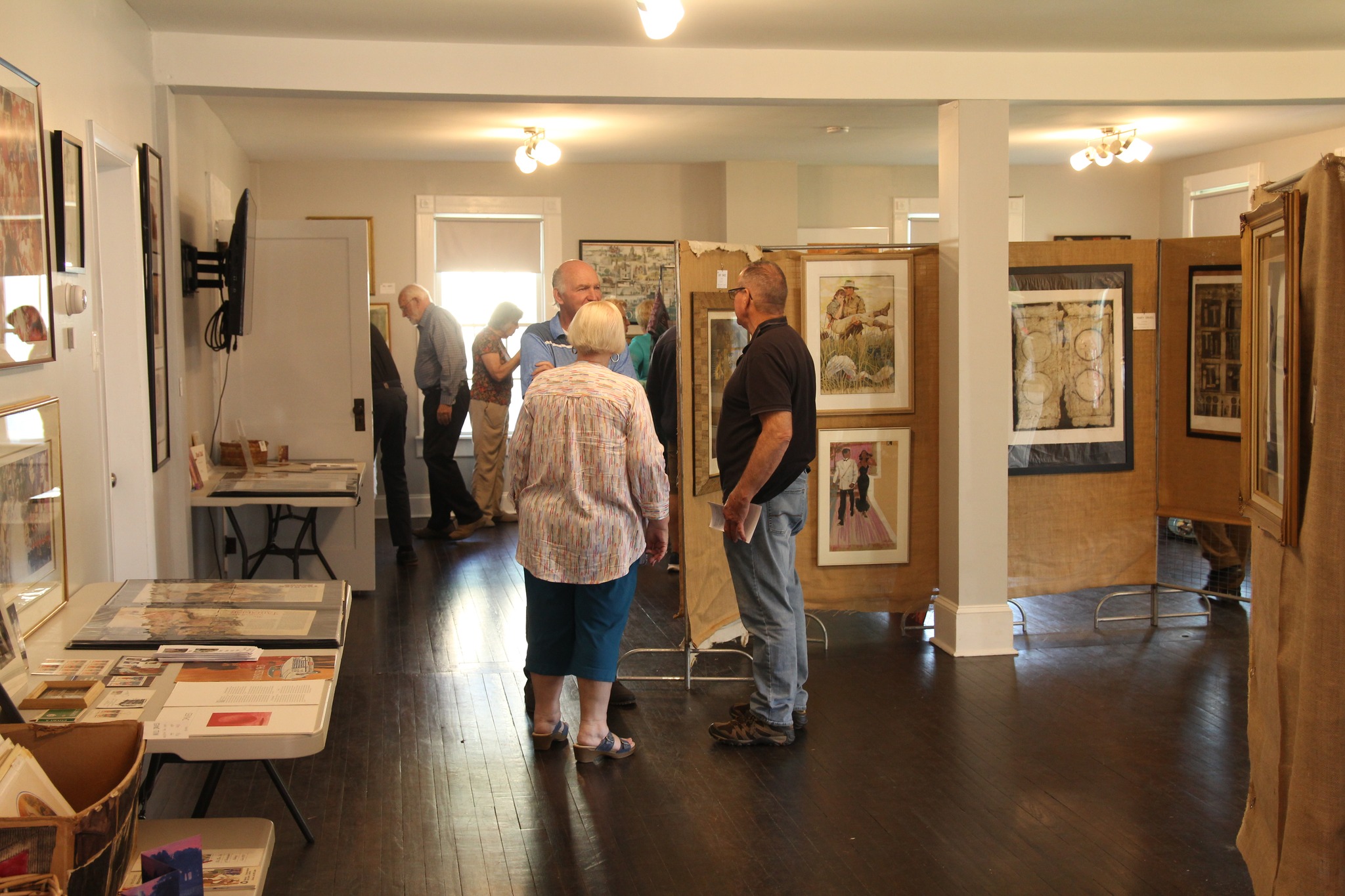 people touring Judd Hall's upstairs