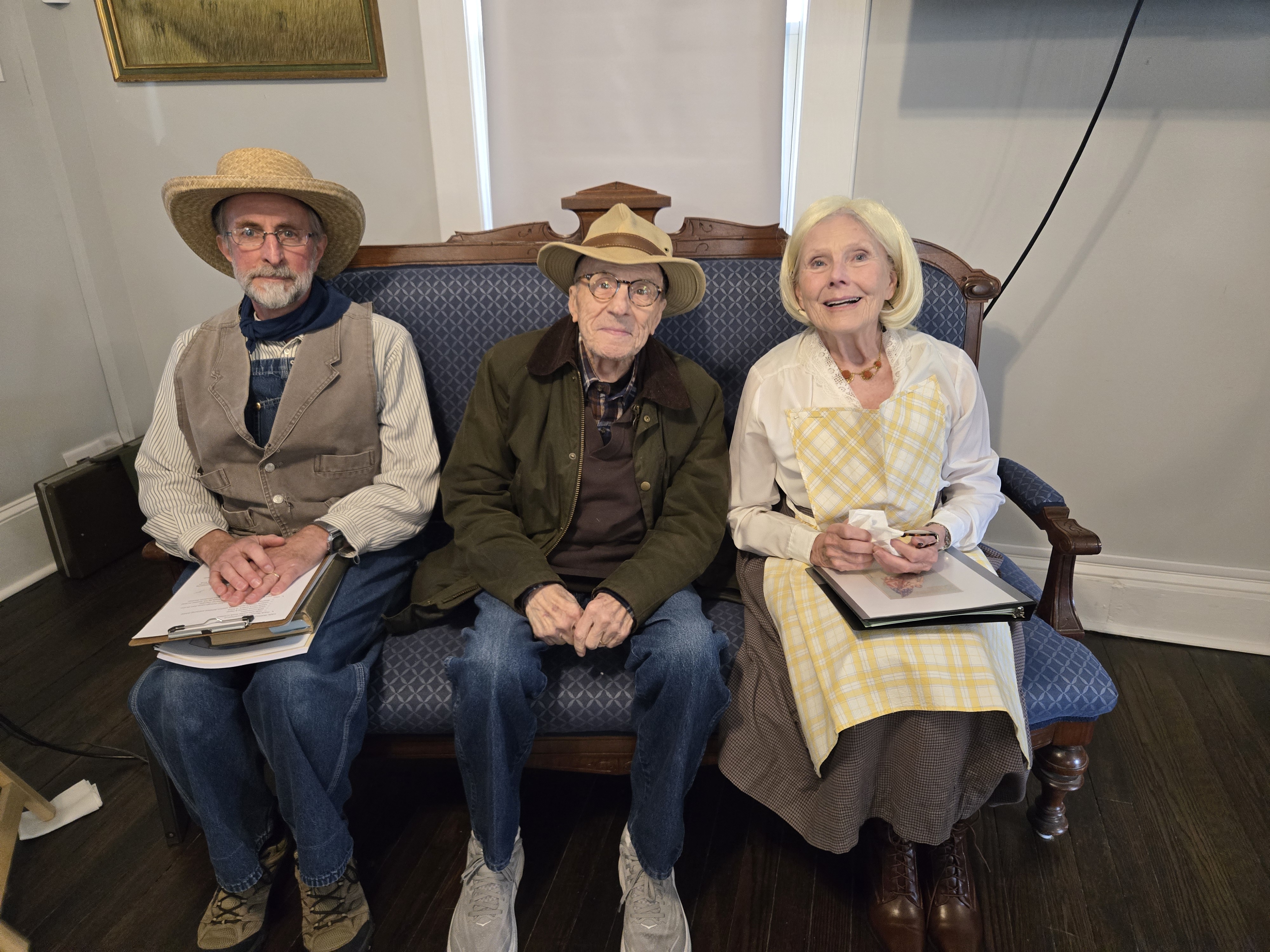 Three people sitting